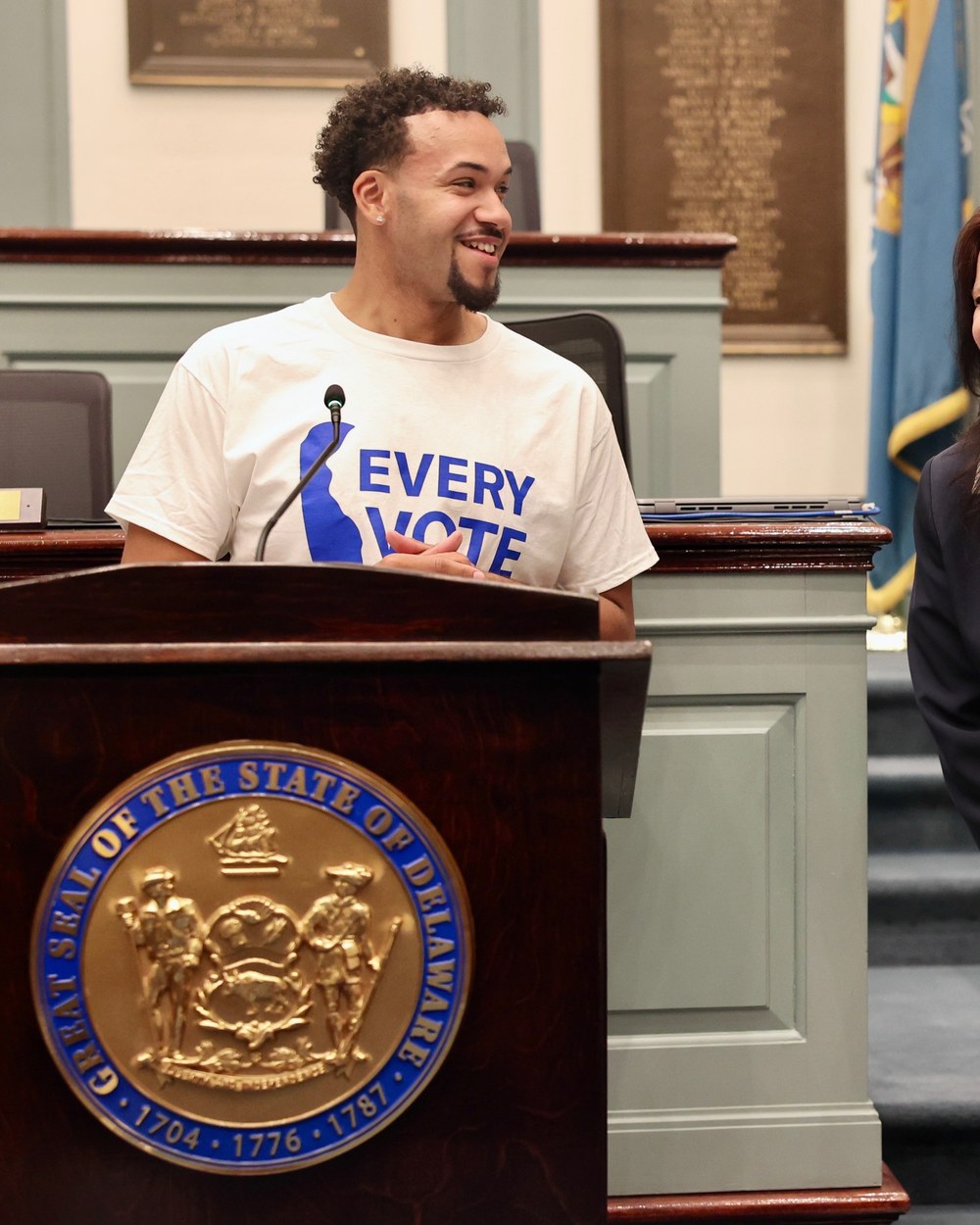 Branden Fletcher Dominguez speaking at the Delaware State House